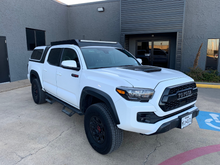 Load image into Gallery viewer, Front passenger view of white Toyota Tacoma with Economy Roof Rack - Cali Raised LED
