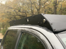 Load image into Gallery viewer, Close up view of gray Toyota Tacoma with Premium Roof Rack with covered light bar - Cali Raised LED