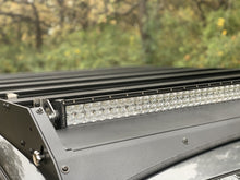 Load image into Gallery viewer, Close up view of gray Toyota Tacoma with Premium Roof Rack with exposed light bar- Cali Raised LED