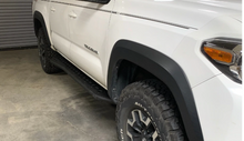 Load image into Gallery viewer, 2005-2022 TOYOTA TACOMA STEP EDITION ROCK SLIDERS