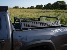 Load image into Gallery viewer, Overland Bed Bars on a Toyota Tacoma
