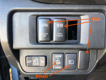 Load image into Gallery viewer, Installed comparison showing short vs tall switches - Cali Raised LEDToyota OEM Style &quot;BACKUP LIGHTS&quot; Switch
