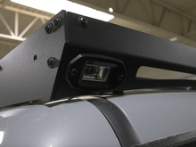 Load image into Gallery viewer, Close up of rear podlight on Premium roof rack - Cali Raised LED
