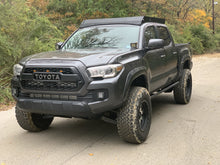 Load image into Gallery viewer, Front drivers side view of gray Toyota Tacoma with Premium roof rack - Cali Raised LED
