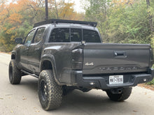 Load image into Gallery viewer, Rear view of gray Toyota Tacoma with Premium roof rack - Cali Raised LED
